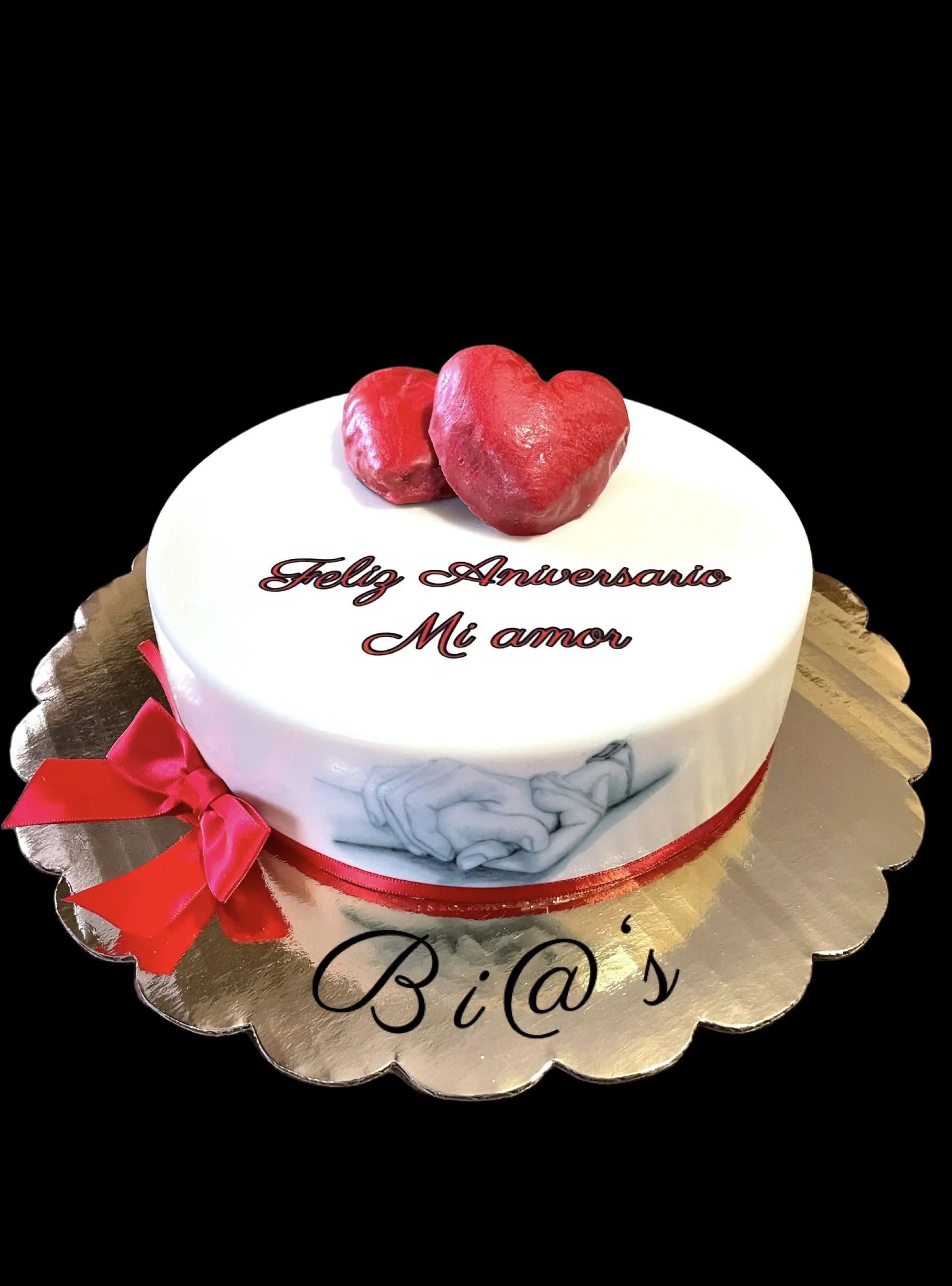 Feliz Aniversario anniversary cake with red hearts, made in Lincoln, Nebraska