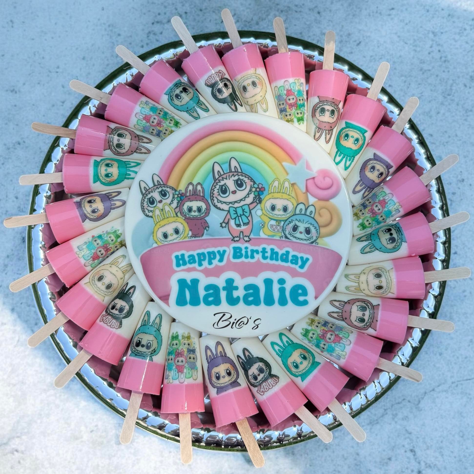 Pink rainbow gelatin pop platter personalized for a Lincoln birthday girl