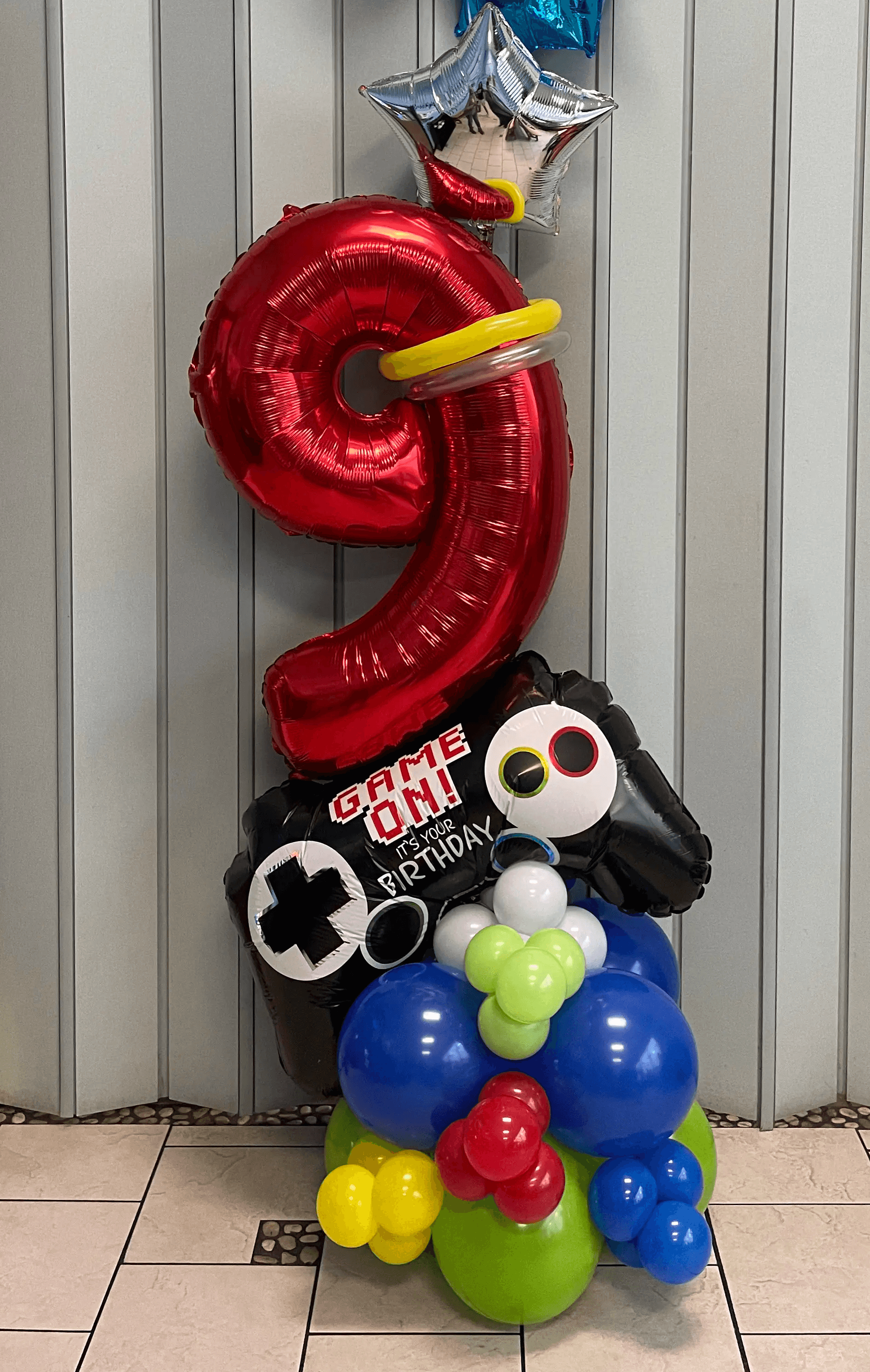 Gamer-themed birthday balloon display