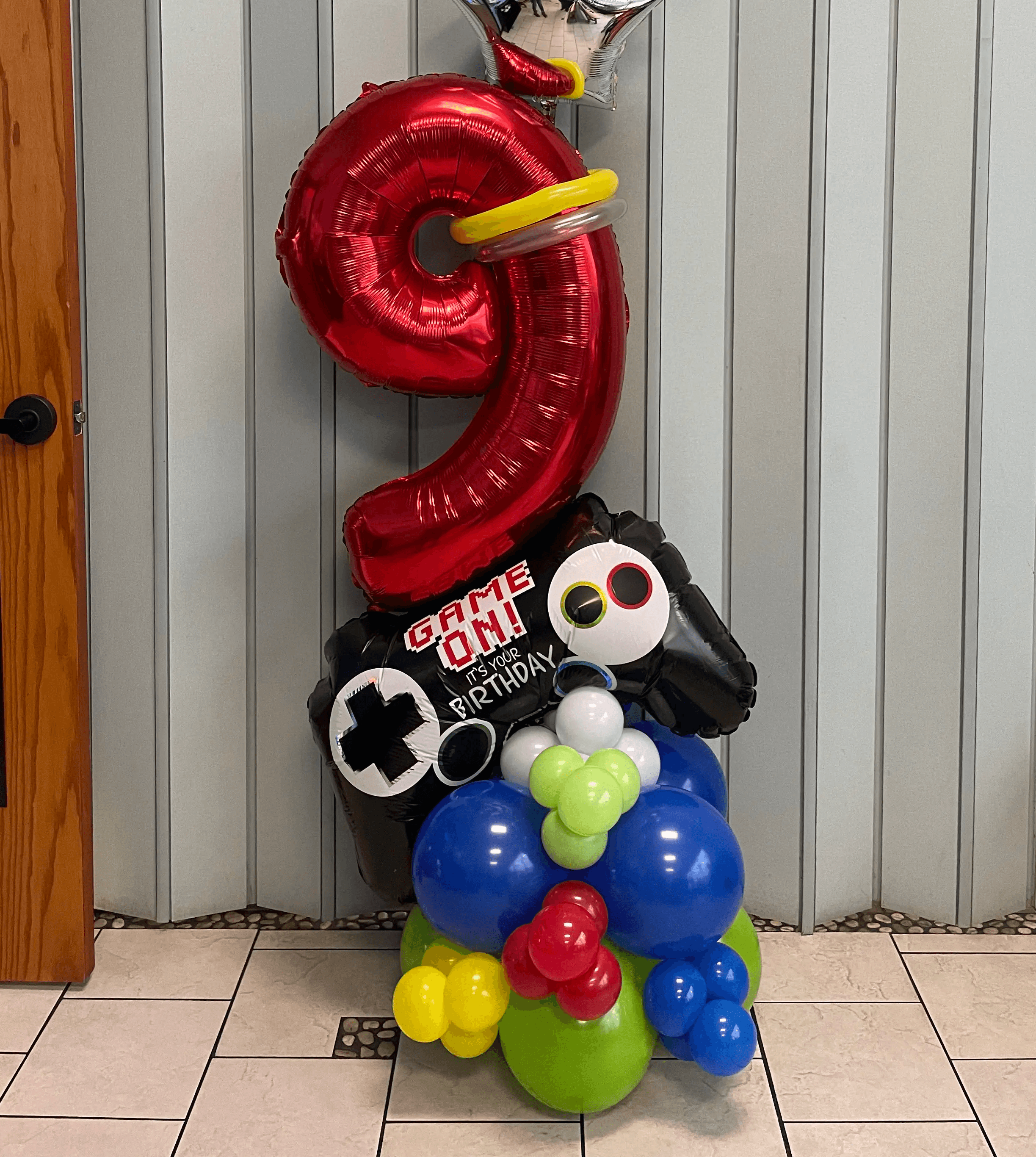 Red number nine gamer balloon display built for a Lincoln birthday